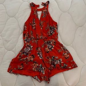 orange with floral short romper